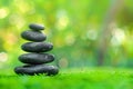 A tranquil and peaceful scene of balanced stones stacked in style of zen gardens. Royalty Free Stock Photo