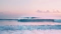 Tranquil Pink Sunrise over Gentle Ocean Waves Royalty Free Stock Photo