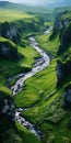 Tranquil River Flowing Through A Lush Green Valley