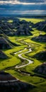 Tranquil River Flowing Through Vibrant Badlands: Aerial View Photography Royalty Free Stock Photo