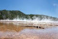 Tranquil river scene with steam rising from the surface along the bank Royalty Free Stock Photo