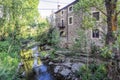 Tranquil River Tera Alongside a Stone Building in Almarza, Soria Royalty Free Stock Photo