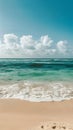 Tranquil sandy beach scene with gentle waves, serene ocean view Royalty Free Stock Photo