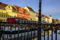 Love locks over tranquil Scandinavian Harbor with water reflections Royalty Free Stock Photo