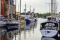 Tranquil Scandinavian Harbor with water reflections Royalty Free Stock Photo