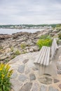 Bench overlooking rocky coastline of Maine Royalty Free Stock Photo