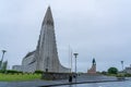 Tranquil scene of Hallgrimskirkja church and Leif Erikson monument after rain in early morning in Reykjavik, Iceland