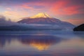 A tranquil scene of mount Fuji and Lake Yamanaka at sunrise Royalty Free Stock Photo