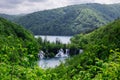 Tranquil scene of the Plitvice Lakes in Croatia with waterfalls surrounded by lush green foliage Royalty Free Stock Photo