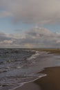 Tranquil scene of a sandy beach and gentle ocean waves Royalty Free Stock Photo