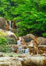 Tranquil scenery of a small creek cascade