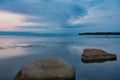 Tranquil Seaside Landscape with Rocks at Dusk Royalty Free Stock Photo