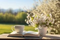 Tranquil spring scene with white coffee cup and book, exuding peacefulness and rejuvenation