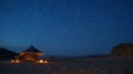 The tranquil stillness of the desert at night broken only by the occasional camels grunt provides a serene backdrop for