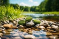 Tranquil stone stack on lush green grass under clear blue sky with interplay of light and shadows