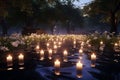Tranquil Stream with Floating Memorial Candles A Royalty Free Stock Photo