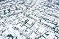 Suburban neighborhood, aerial view. snow-covered streets and rooftops