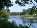 A Tranquil Summer Scene of the River Ribble at Preston, Featuring a Charming Pedestrian Bridge Royalty Free Stock Photo