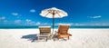 Tranquil summer vacation destination. Romantic getaway beach, chairs beds white sand with blue sky. Tropical landscape background Royalty Free Stock Photo