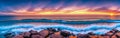 Tranquil summer vacation or holiday landscape. Panoramic sunset beach landscape. Orange and golden sunset sky. calmness relaxing