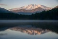 Tranquil sunrise illuminates the serene beauty of the lake