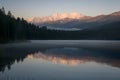 Tranquil sunrise illuminates the serene beauty of the lake