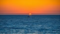Tranquil sunset over water, nautical vessel silhouette, reflection and beauty generated by AI Royalty Free Stock Photo