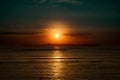 Tranquil Sunset Reflection on Calm Red Sea Horizon over Saudi Arabia from Dahab Egypt