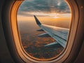 Generative AI. Serene Sunset View From an Airplane Window Over a Vast Landscape Royalty Free Stock Photo