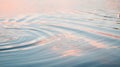 Calm Water Surface With Gentle Ripples Reflecting Sunset Colors Royalty Free Stock Photo