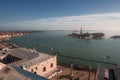 Tranquil Venice cityscape with serene waterways and buildings, no boats or landmarks visible.