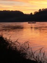 Tranquil view of Boat on Nam Kahn River at sunset, Luang Prabang, Laos