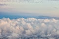 Tranquil view of a clear blue and pink sky above the fluffy white clouds Royalty Free Stock Photo