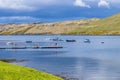 A tranquil view down the shore of Loch Harport at the village of Carbost on the Isle of Skye, Scotland