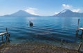 Tranquil view on lake Atitlan with view on volcano peaks in Santa Cruz la Laguna, Guatemala