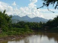 Tranquil view of Nam Kahn River and mountains, Luang Prabang, Laos