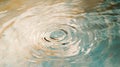 Tranquil water ripple with golden and blue reflections in natural light Royalty Free Stock Photo