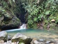 Tranquil Waterfall Oasis, Serenity in the Forest Royalty Free Stock Photo