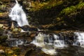 tranquil waterfall in Pennsylvania forest during autumn