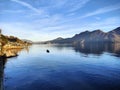 Tranquil Waters of Lake Maggiore: A Boat's Serenity