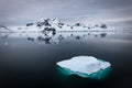 Tranquil winter landscape with floating ice in Skontorp Cove, Antarctica.