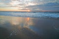 Tranquility scene, beautiful tropical beach sunset in light pink and blue colors with beautiful sun reflection