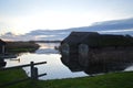 Tranquillity at the Hickling Broad Norfolk Thatched Boathouses Royalty Free Stock Photo