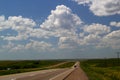 Trans-Canada Highway heading west of Calgary, Alberta, Canada - An Endless road / journey / roadtrip / adventure