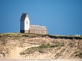 Trans Church on cliff from North Sea, Ferring, Lemvig, Central Jutland, Denmark Royalty Free Stock Photo