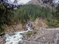 Trans-Ili Alatau mountain range of the Tien Shan system in Kazakhstan near the city of Almaty. Rocky peaks covered with snow and g Royalty Free Stock Photo