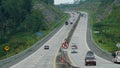 Trans Java toll road that cuts through the hills during the day