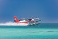 Ari Atoll, Maldives - 05.05.2018 - Sea plane at tropical beach resort. Luxury summer travel destination with seaplane in Maldives