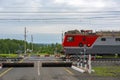 TRANS-Siberian railway, electric freight locomotive at the crossing