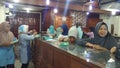 Transaction in jewelry store. Sale and customer service in the store.